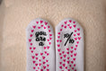 Load image into Gallery viewer, Pair of white insoles with pink heart patterns and text on a beige surface - Thread Vision Client Spotlight, 10/10 Deanna Giulietti