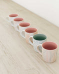 Load image into Gallery viewer, Set of colorful mugs arranged in a row on a wooden surface - Thread Vision Spotlight, Loverly Grey
