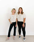 Load image into Gallery viewer, Two women wearing matching outfits with white tops and black pants against a white background - Thread Vision Spotlight, Loverly Grey