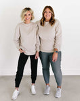 Load image into Gallery viewer, Two women wearing beige sweatshirts and pants standing against a white background - Thread Vision Spotlight, Loverly Grey