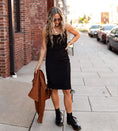 Load image into Gallery viewer, Woman in a black dress with a brown jacket on a city street. - Thread Vision Spotlight, Hill x Sarah, Sarah Hill 
