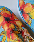 Load image into Gallery viewer, Colorful floral-patterned fabric with a close-up of a flower design. - Thread Vision Client Spotlight, Goldfish Kiss
