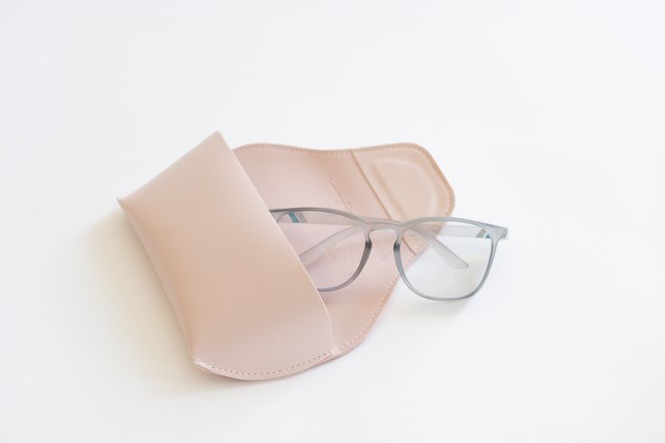 Glasses with a pink case on a white background - Thread Vision Spotlight, Remington Avenue