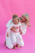 Load image into Gallery viewer, Woman and child in matching pink and white sweater outfits on a pink background - Thread Vision Spotlight, Rydel
