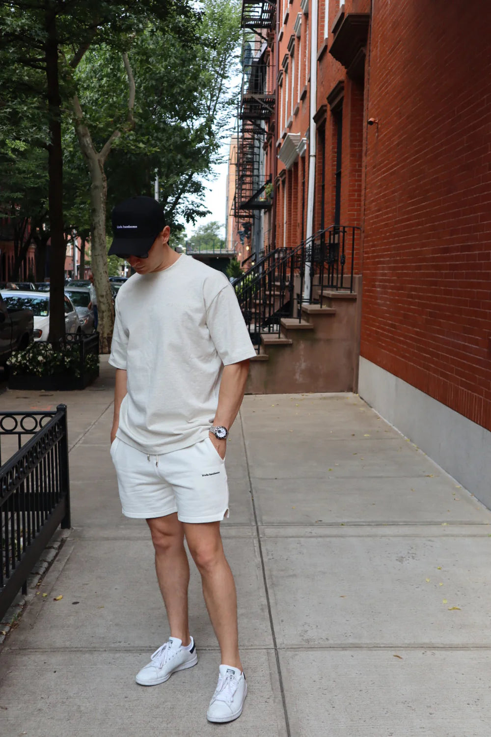 Person wearing a beige outfit with white sneakers on a sidewalk. - Thread Vision Spotlight, Kinda Handsome