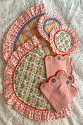 Load image into Gallery viewer, Set of pink floral-patterned oven mitts and pot holders on a textured white background - Thread Vision Client Spotlight, Maude& May by Talia Hubble
