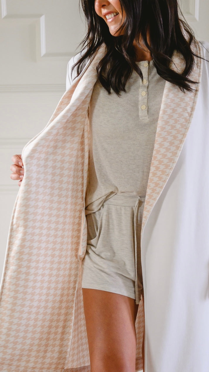 Woman wearing a grey outfit set with a checkered bathrobe, indoors - Thread Vision Spotlight, Remington Avenue