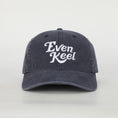 Load image into Gallery viewer, Navy blue cap with 'Even Keel' text on a light gray background - Thread Vision Client Spotlight
