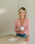Load image into Gallery viewer, Woman in a pink cardigan holding a mug with a neutral background - Thread Vision Spotlight, Loverly Grey

