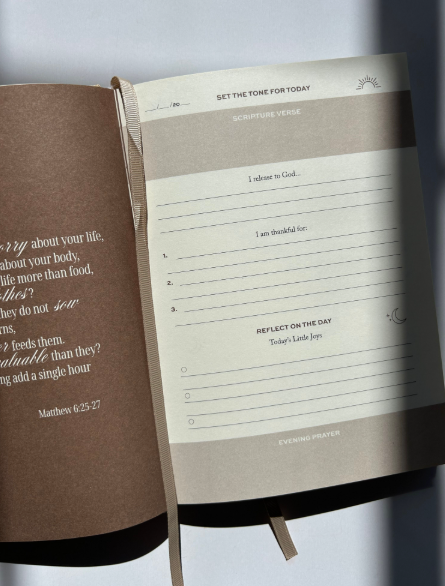 Open planner with a reflective section on a light gray background - Thread Vision, Client Karina Faith Diaries