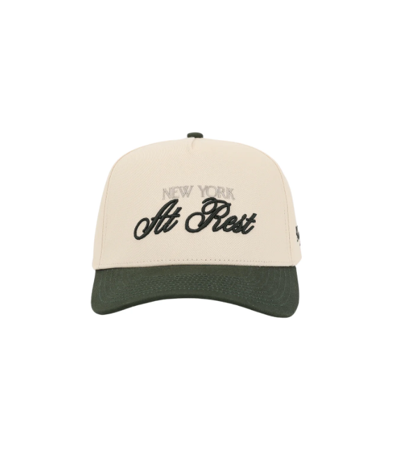Trucker hat with 'New York At Rest' text on a white background -  - Thread Vision, Client Kinda Handsome