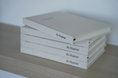 Load image into Gallery viewer, Stack of books titled 'the blueprint' on a wooden surface with a white background Thread Vision Spotlight, HMBDY
