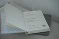 Load image into Gallery viewer, Open book with text and a QR code on a textured surface Thread Vision Spotlight, HMBDY
