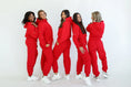 Load image into Gallery viewer, Five women wearing matching red sweatshirt and sweatpants outfits on a white background - Thread Vision Spotlight, Day 1 Fitness, Kaylee Rogers 

