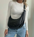 Load image into Gallery viewer, Person wearing a black shoulder bag with a plain background - Thread Vision Spotlight, Hill x Sarah, Sarah Hill 
